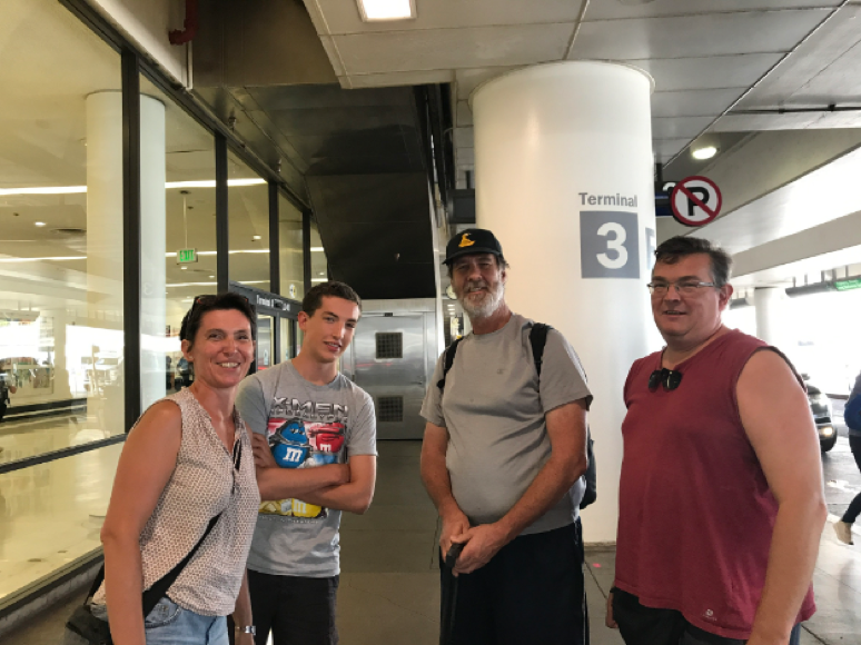 HomeExchange Members meeting at the airport