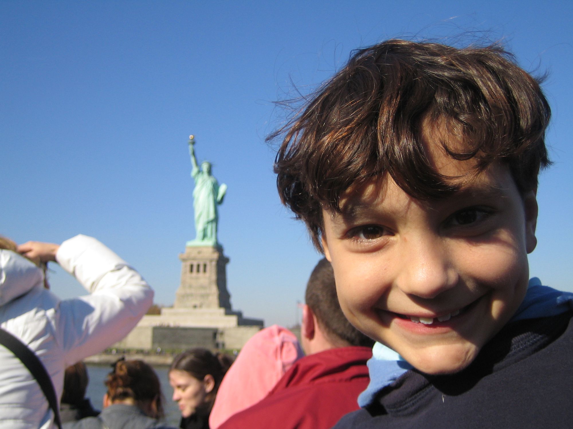 Kid enjoying Statue of Liberty family vacation New York USA