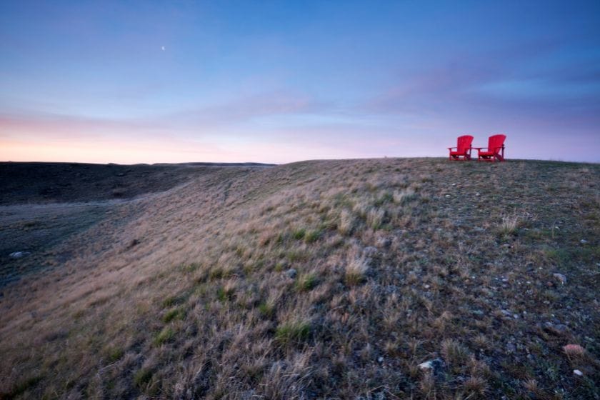 The famous red chairs of Parks Canada at Grasslands National Park