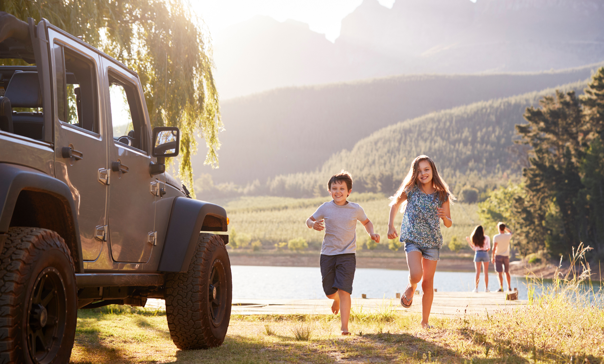 Children enjoying time at the lake with their parents