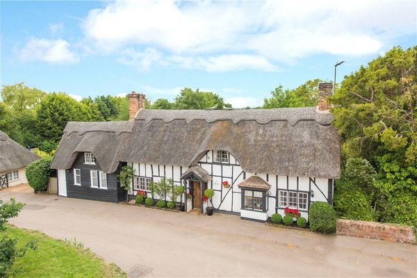 Thatched and grade 11 listed village home