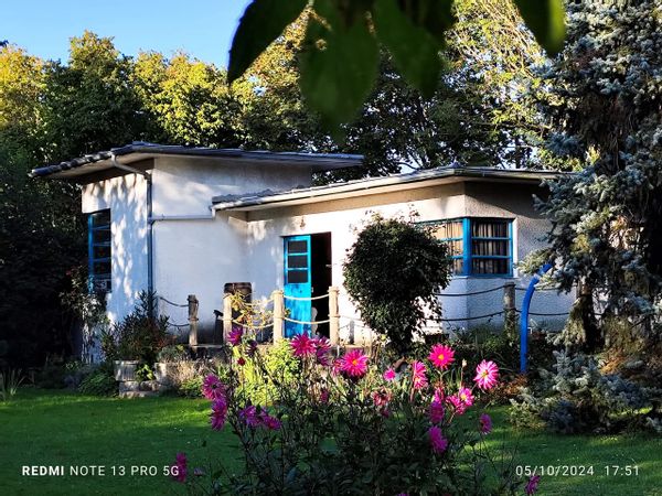 Charming wooden house on an island near Paris (on the Seine river)