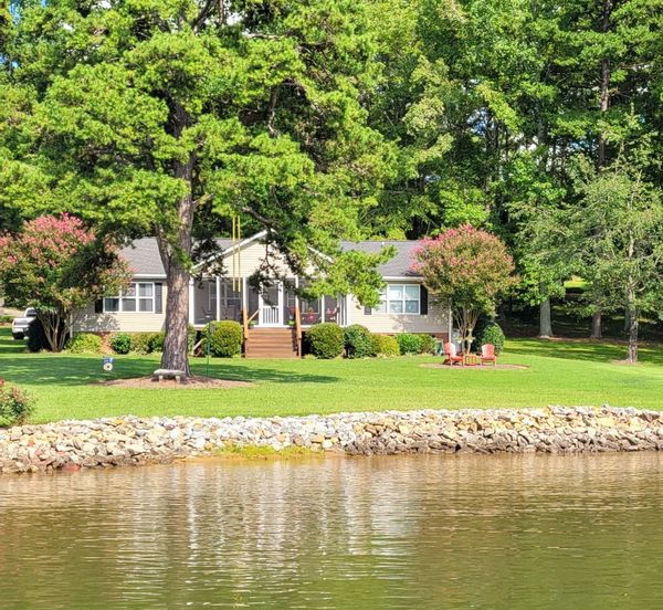 Serene Lakehouse located in a quiet cove on Lake Norman.