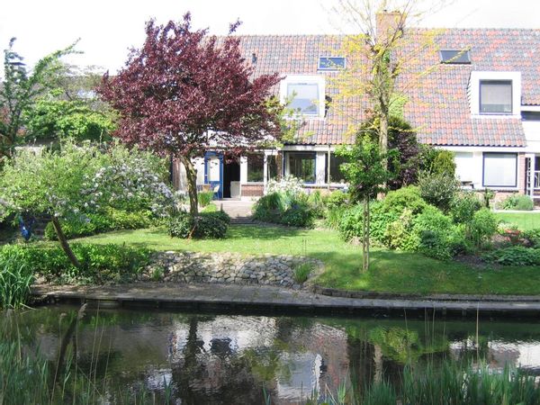 Family house with canal in the backyard