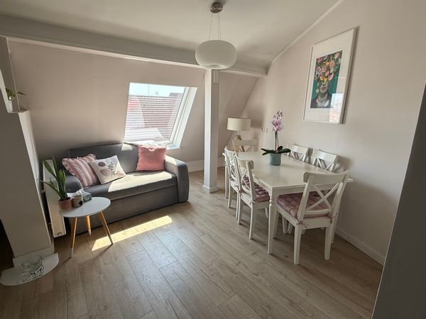 Cozy Top-Floor Apartment with City Views