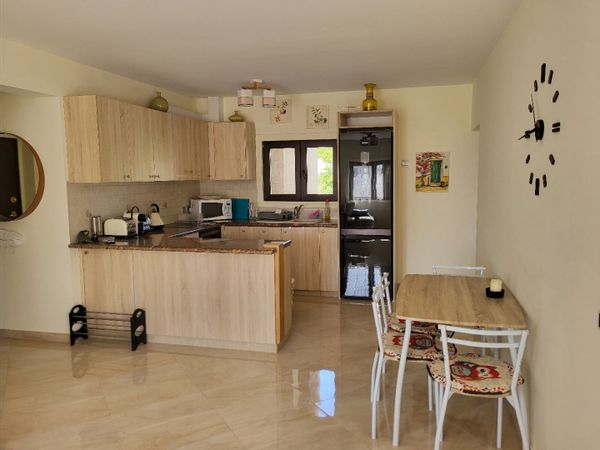 Gated beach condo with swimming pool, tennis court and parking