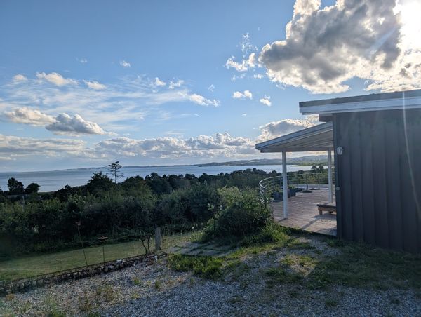 Cozy seaside retreat with panoramic views and spacious terrace. Near beach and historic Ebeltoft