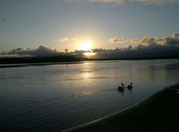 Cottage near surf and lake.