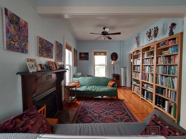 Single Family Home in Jamaica Plain with 4 bedrooms, an office, and big front yard. Central location
