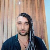 Cozy 1-bedroom loft with natural light, tropical style, memory foam bed, and saltwater pool access.